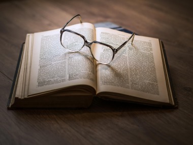 writer reading classic book