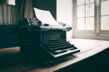 vintage writer portrait and typewriter
